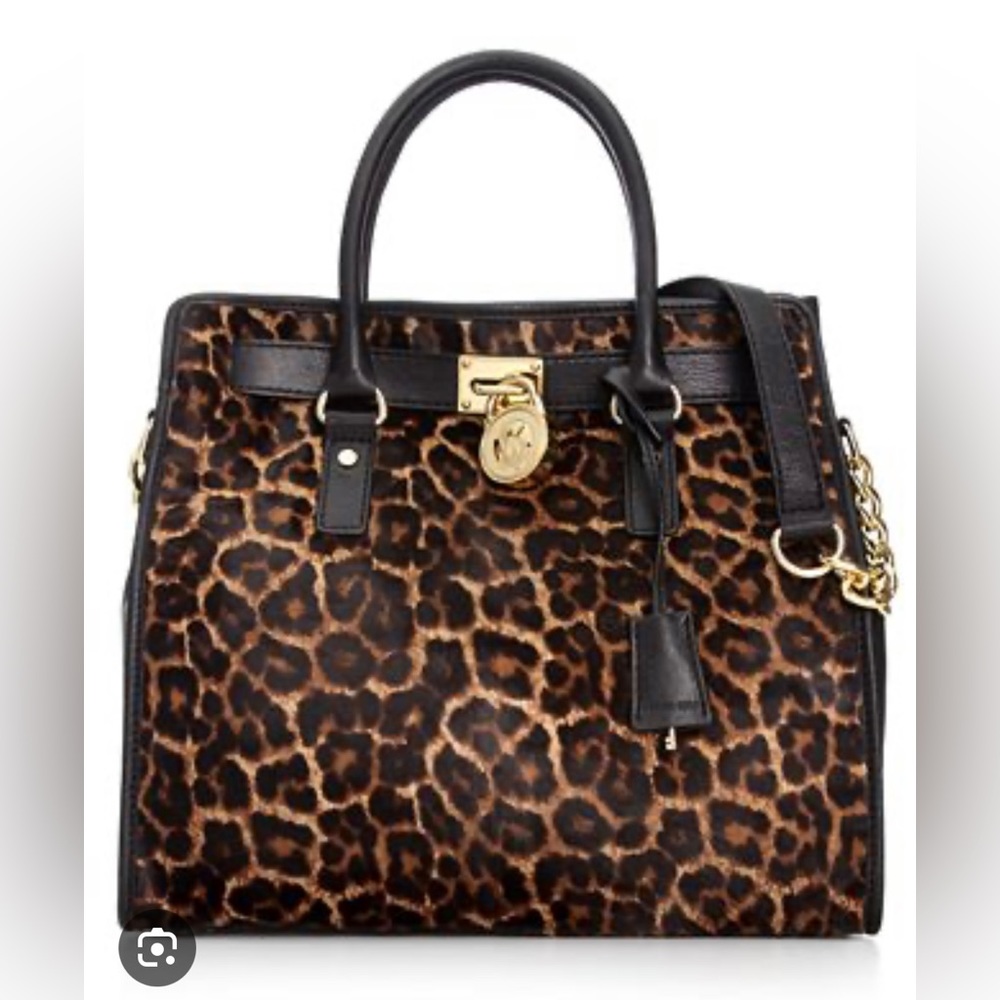 Michael Kors leapord purse! Like New only used a few times. Super classy!